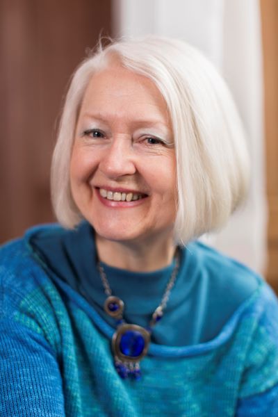 Headshot of Christine De Luca