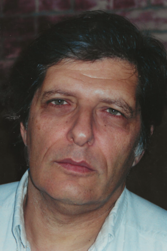 Headshot of poet Lewis Warsh