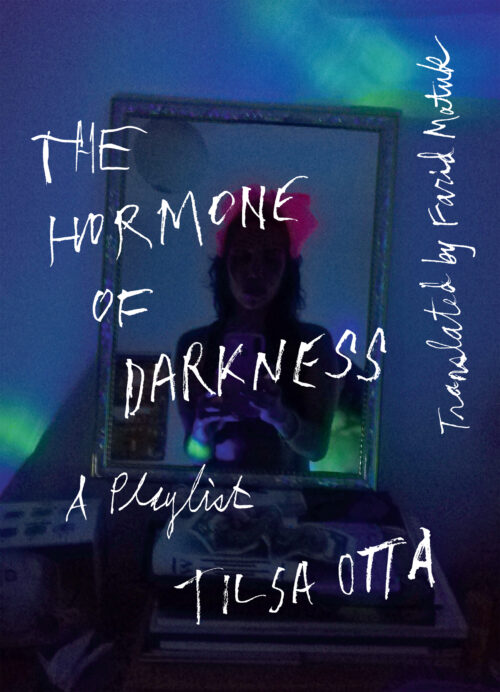 a woman taking a photo of herself in a mirror behind the words "The Hormone of Darkness"